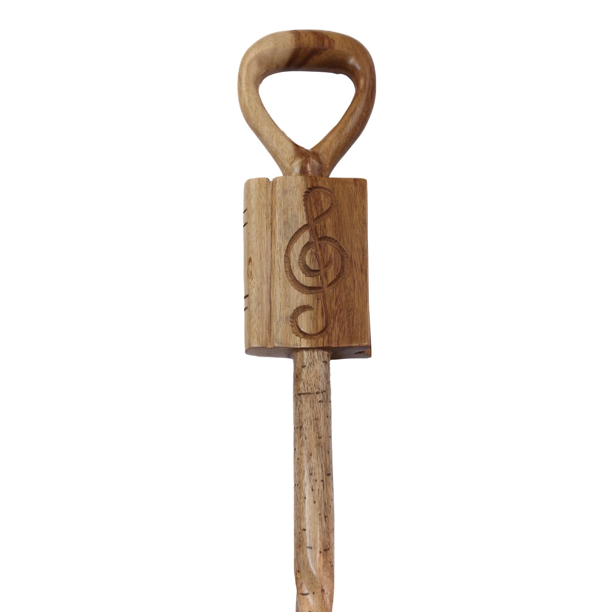 Hand-Carved Ghanaian Walking Stick Showcases Music Notebook