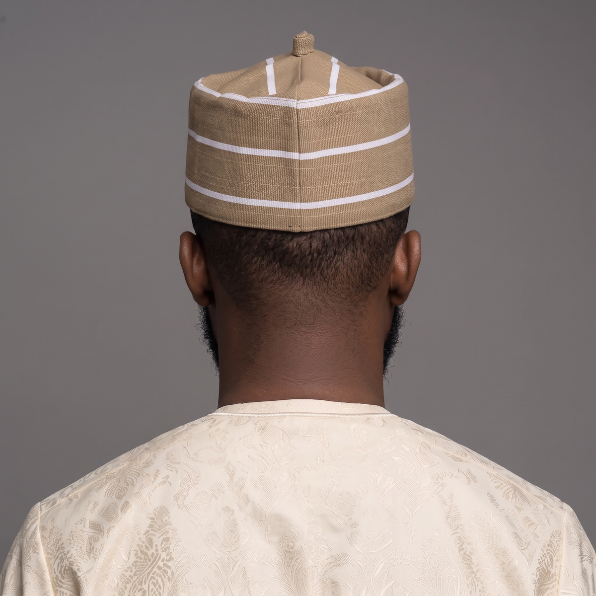 Tan and White (Aso-Oke) Striped Woven Cap with Traditional Top Knot